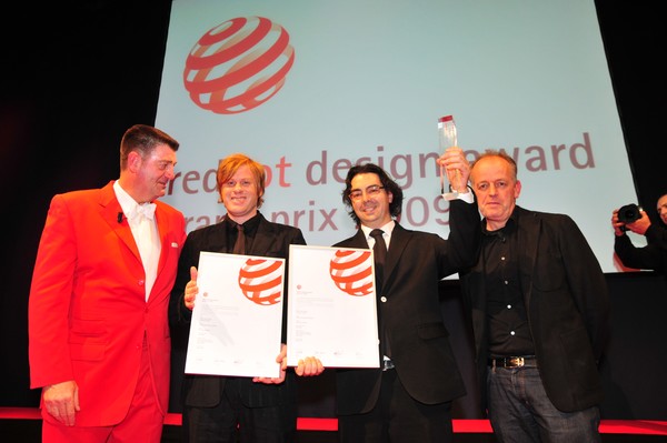 On stage at red dot awards in Essen, Germany are Professor Dr Peter Zec, president of red dot awards, Dean Poole and Ben Corban, of Alt Group with grand prix award, and international juror, Michel de Boer, from the Netherlands.